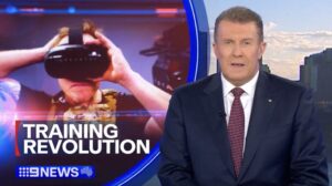 Screengrab from Channel 9 / 9 News segment with Peter Overton and to the left is a person wearing an Operator XR VR headset with white text that says "Training Revolution"